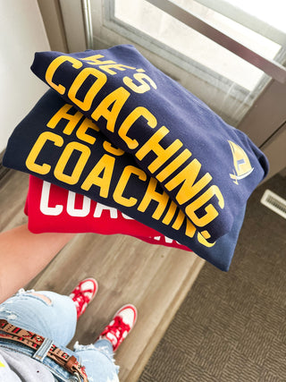"HE'S COACHING." CREWNECK